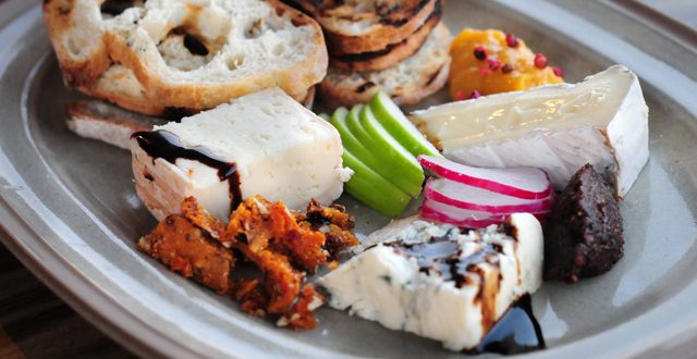 Cheese plate with nut brittle, fig jam, apricot mustard and toast: Elliott Muñoz