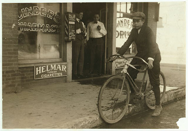 A delivery boy straddles his bike in downtown Dallas in the 1930s. Photo courtesy of the Library of Congress