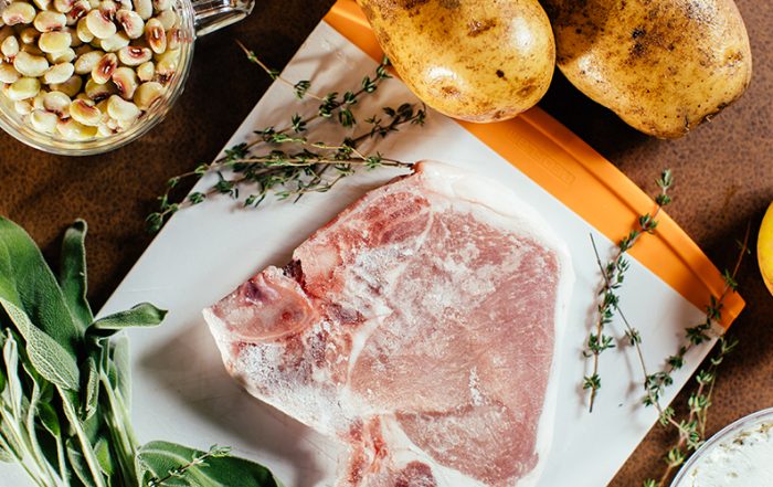 All the fixings for a pork chop dinner with purple hull peas, potatoes, thyme and sage. (Photo by Kathy Tran)