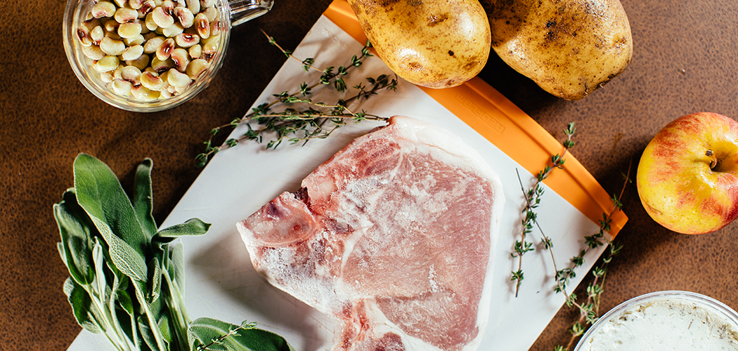 All the fixings for a pork chop dinner with purple hull peas, potatoes, thyme and sage. (Photo by Kathy Tran)