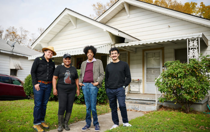 Angel Faz, Vicki Meek, Jonathan Norton, Christian Vazquez stand in front of Tenth Street house